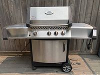 Front view of complete barbecue grill on deck
