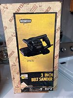 Original retail box for Craftsman 3 inch belt sander with branding and image of the tool on front