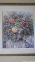 Framed floral watercolor-style print showing detailed bouquet on lace with ornate gold frame