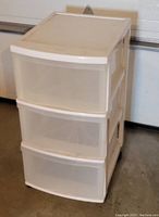 Front view of the 3 drawer plastic rollaway storage unit showing all three drawers intact with visible wear.