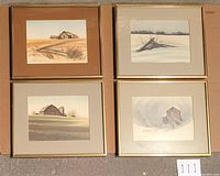 Four framed prints by James Bessey showing rural barns and farmhouses, arranged in a two-by-two grid.