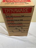 Box of Dynaware glass bake set, listing product uses and guarantee.