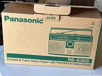 Original cardboard box front with Panasonic logo, model RS-836S and product illustration