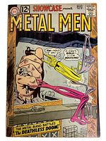Cover of Metal Men issue No. 39 August showing the Metal Men characters in action in an industrial setting with the classic 12¢ price and DC Comics branding.