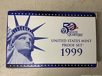 Front box of the United States Mint Proof Set 1999 showing Statue of Liberty and 50 state quarters logo.
