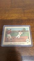 Front of 1959 Fleer Ted Williams baseball card, showing the illustration of Ted Williams and caption '1934 - Ted Learns The Fine Points'