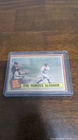 Front of the 1962 Topps Babe Ruth baseball card showing Babe Ruth in batting stance with 'The Famous Slugger' title and 'Babe Ruth Special' badge.