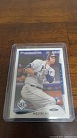 Topps Kevin Kiermaier rookie baseball card in clear protective case showing full front image and player in Tampa Bay Rays uniform.