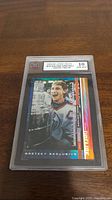 Front of 1999-00 Upper Deck Wayne Gretzky card with grading label showing 10 Gem Mint by KSA