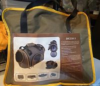Photo of the pet carrier packaging showing product images and description.