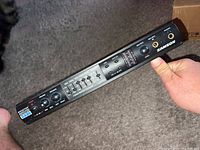 Front-height angled photo of the Samson D880 FT audio system showing controls and front panel
