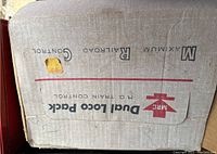 Sticker on box showing 'Dual Loco Pack H.O. Train Controller', marked with MRC and labeling for maximum railroad control.