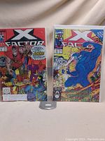 Front cover of X-Factor #41 and #69 comics displayed side by side showing colorful action covers