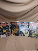 Four Batman Year 3 comic books bagged and boarded showing cover front art and numbered issues.