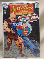 Front cover photo of Adventure Comics issue 351 showing Superboy and a villain with a large weapon. Comic is bagged and boarded.