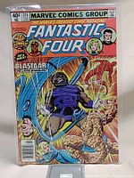 Front cover of Fantastic Four #215 comic book showing Blastaar and the Fantastic Four characters in action, titled 'The Living Bomburst'.