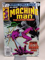 Front cover of Machine Man #11 comic showing character and title with vibrant colors and cover price.