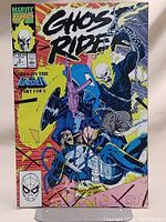 Front cover of Ghost Rider #5 comic featuring The Punisher, shows vibrant comic book art by Jim Lee, Marvel Comics logo, price $1.50 US, and Sept 1990 date.
