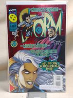 Front cover of the comic book showing Storm and Callisto characters, with autograph dated 1996 and certification sticker visible
