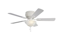 Photo of white ceiling fan with five blades and alabaster glass light shade, flush mount design.