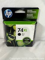Front view of HP 74XL black ink cartridge packaging highlighting brand and cartridge model.