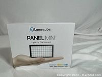 Front view of Lume Cube Panel Mini box showing product image and branding.