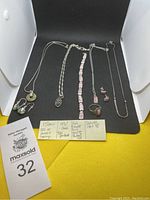 Full lot arranged on black background with handwritten note