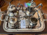 Full set of Canadian made Viking Plate silver coffee and tea set on the silver serving tray, showing all five main pieces exhibiting tarnish and wear.