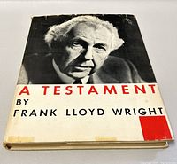Front cover of the book showing Frank Lloyd Wright's black and white portrait and title text.