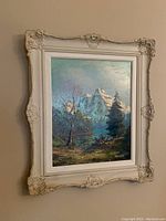Full view of the framed original artwork depicting a mountain lake scene.