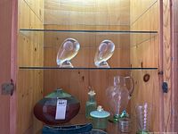 Multicolored signed pottery vase showing shape and glaze