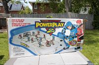 Box of PowerPlay 2 rod hockey game showing game illustration and branding.