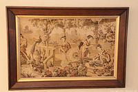 Photo of framed textile tapestry with sepia image of Japanese garden scene showing multiple figures, trees, peacock, and traditional garden elements.