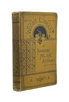 Front and spine view of the mustard-yellow hardcover medical book with black decorative text 'Wood's Library of Standard Medical Authors' and medical emblem.