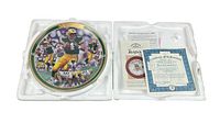 Full view of the Brett Favre collectible plate in original foam packaging with certificate of authenticity and literature.