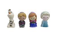 Front view of the four toy figures Olaf, Kristoff, Anna, Elsa