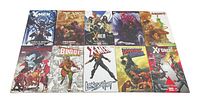 10 trade paperback Marvel comic books laid out in two rows showing cover art of X-Men, Phoenix, Runaways, Blade, X-Force and others.