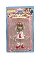 Front view of sealed SEGA Love & Berry Kisekae figure Lovely Strawberry in original blister pack with pink and blue cardboard backing covering.