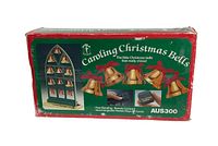 Front view of the original product box for Caroling Christmas Bells AU5300 showing product imagery and text.