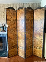Full view of the four-panel folding screen showing vintage map design.