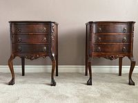 Two matching side tables shown front view