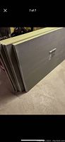 Side view of stacked DensShield boards showing thickness and count