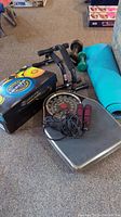 Fitness lot showing Salter scale, Heeley's shoe box, push-up bars, dumbbells, yoga mat and skipping rope