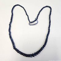 Full view of natural sapphire bead necklace.