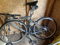 Side view of the Timberline GT 18 speed bike showing the full frame, wheels, and handlebars.