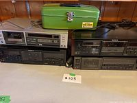 Four Sony cassette decks on table with green Union Tool Chest on top