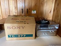 Sony TC-377 stereo tape deck in original cardboard box labeled 'This Side Up'