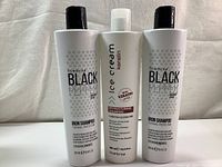 Front view of three shampoo bottles: two Inebrya Black Pepper Iron Shampoo and one Inebrya Ice Cream Keratin Restructuring Shampoo.