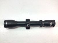 Front side view of the Excalibur branded crossbow scope showing the lens and adjustment turret.