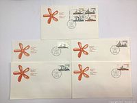 Five 1978 Canadian First Day Covers laid out showing stamps and orange starfish emblem.